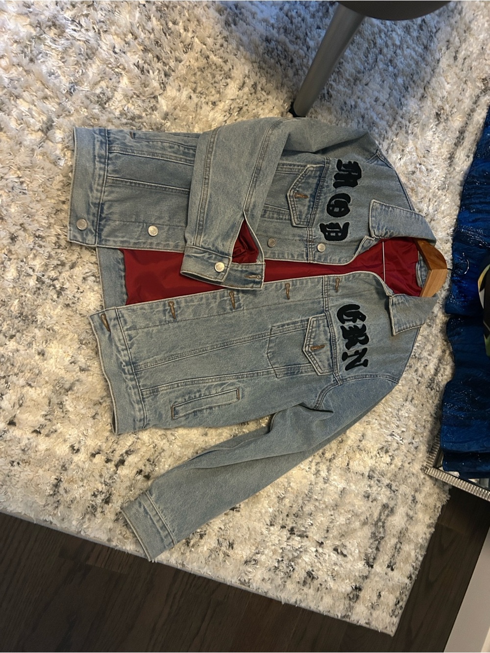 Ada Light Blue Denim Jacket with Red Lining and Black Lettering